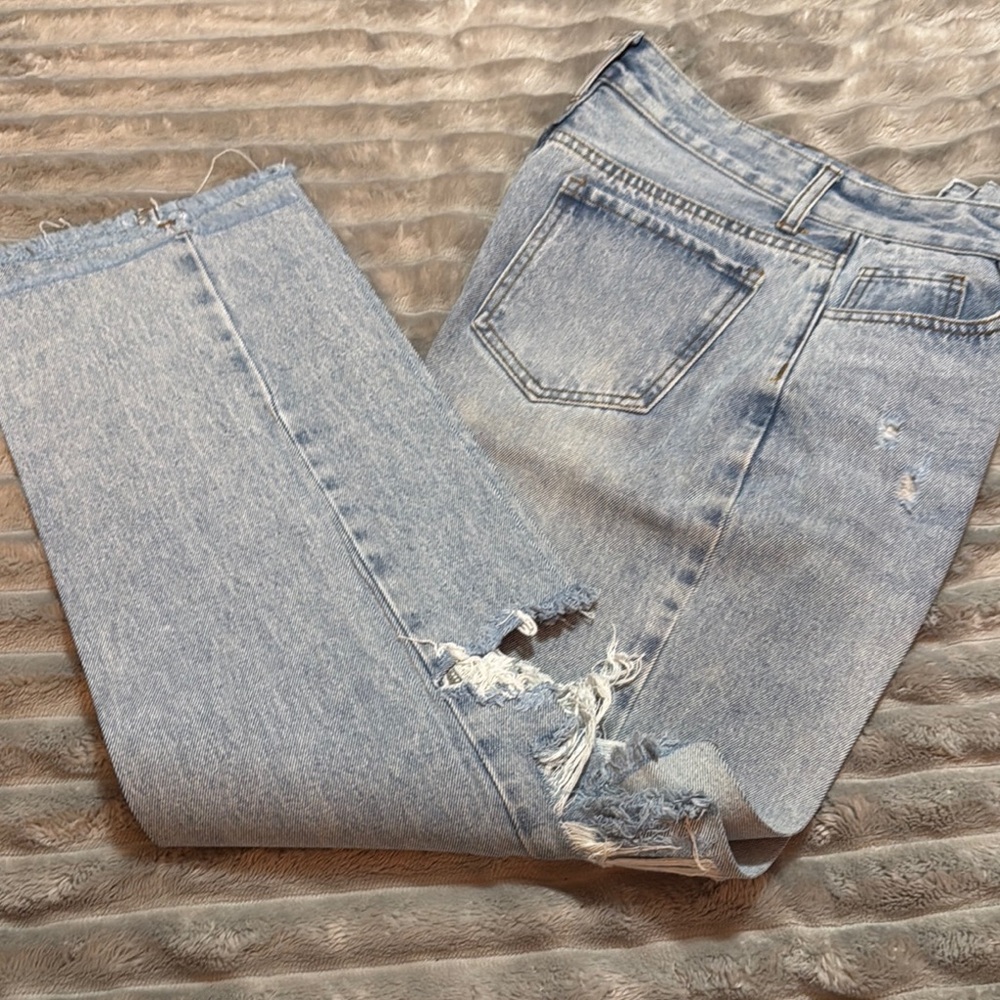 Distressed Light Wash Denim Jeans